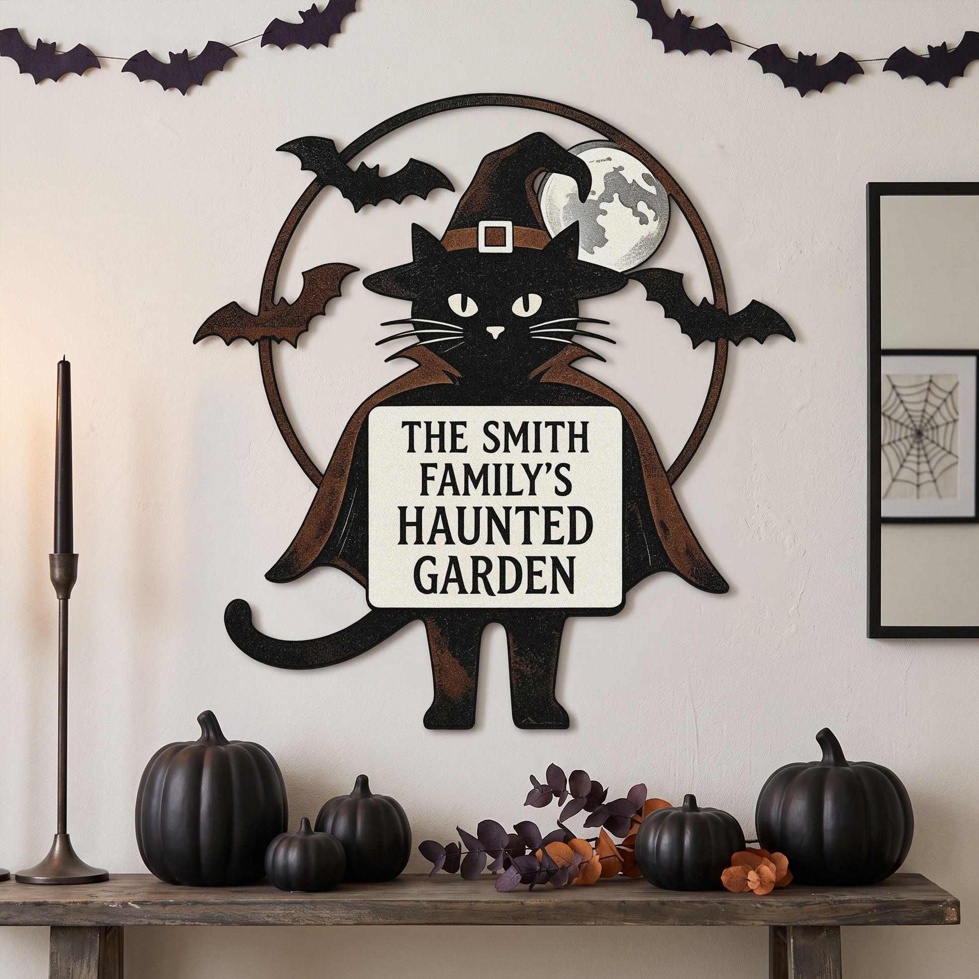 Witch cat haunted garden stake in a yard