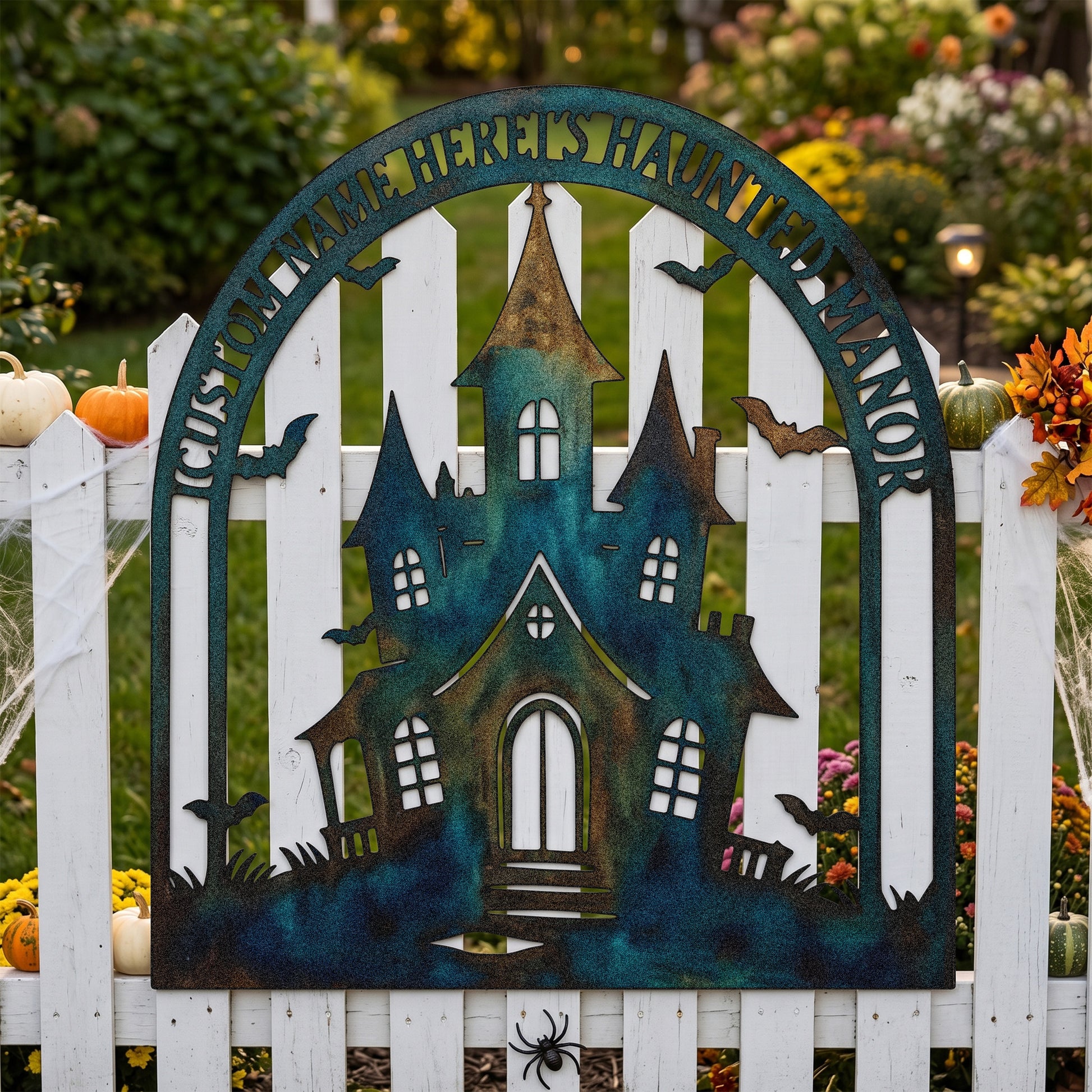 Personalized Haunted Manor Halloween Garden Sign in a garden