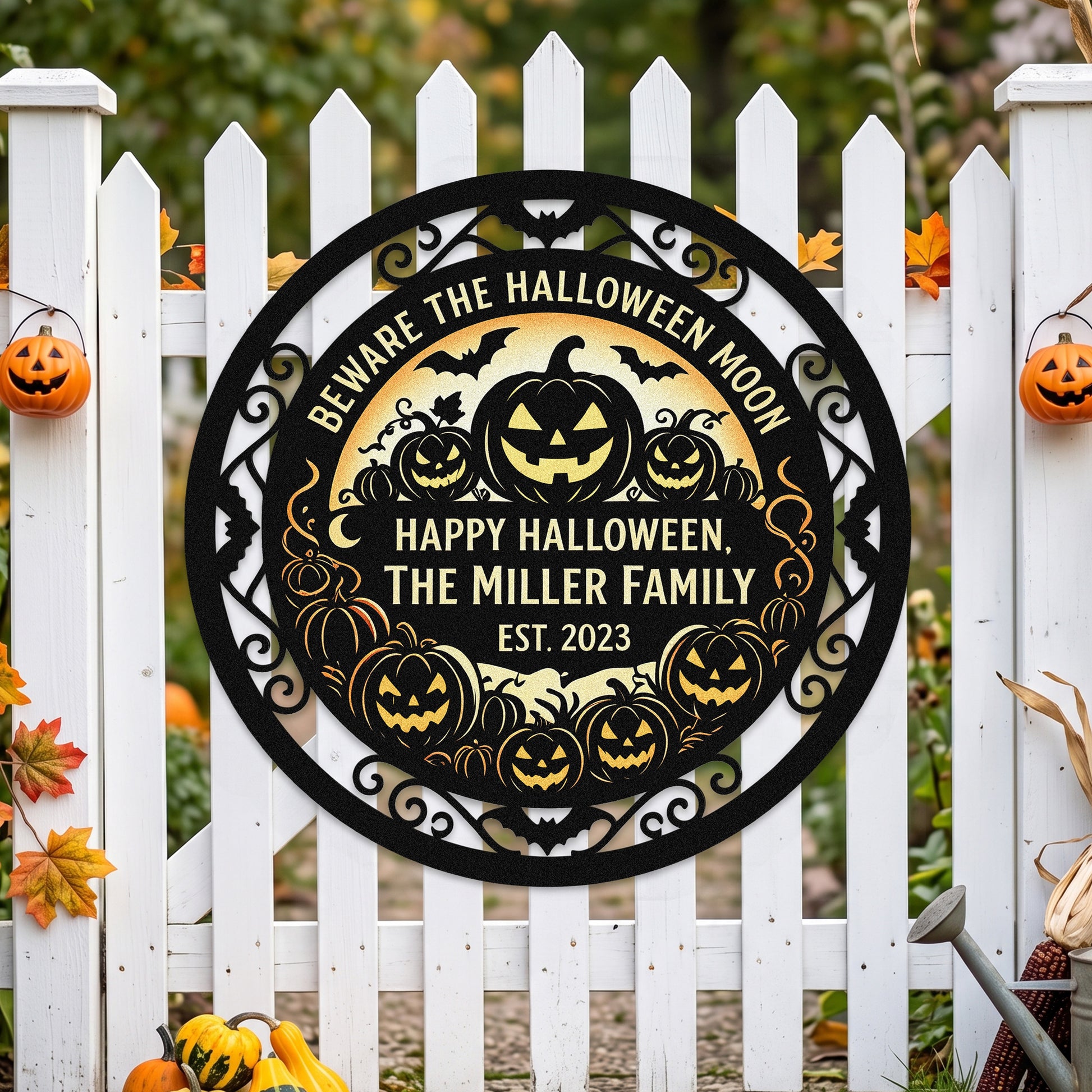 Halloween moon family garden stake among pumpkins