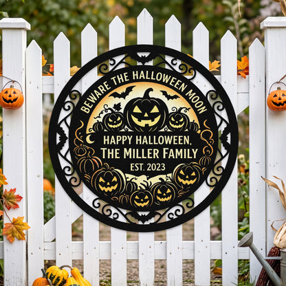 Halloween moon family garden stake among pumpkins